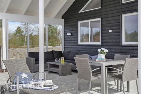 Das Luxusferienhaus Nr. 393 hat eine tolle Terrasse, die mit hochwertigen Gartenmöbeln für 20 Personen ausgestattet ist.