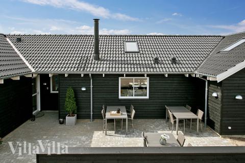 Auf der Terrasse des Ferienhauses Nr. 393 ist Platz für 20 Personen.