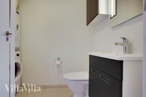 Eines der Badezimmer im Luxusferienhaus Nr. 395