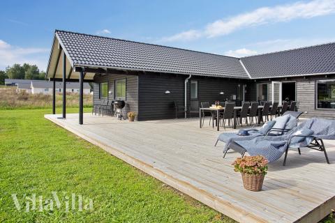 Auf der Terrasse des Ferienhauses Nr. 395 ist Platz für 20 Personen.