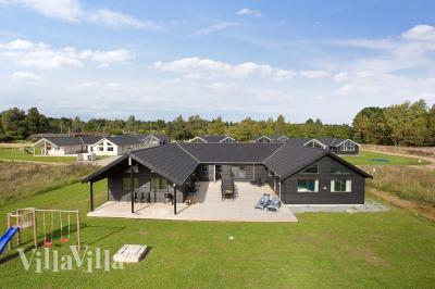 Dieses schöne Poolhaus Nr. 395 mit Platz für 20 Personen liegt in Nordseeland