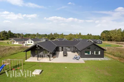 Lichtdurchflutetes Ferienhaus mit Pool Nr. 395 für 20 Personen in Vejby Strand, Nordseeland – mit Whirlpool, Sauna und Aktivitätsraum, Dänemark