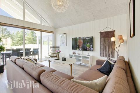 Aufenthaltsraum mit Platz für 16 im Luxusferienhaus Nr. 396.