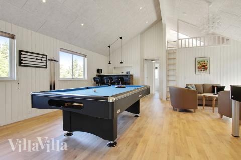 Neben den vielen schönen Stunden, die man im Poolbereich des Hauses verbringen kann, bietet das Luxusferienhaus 396 auch Spielevergnügen bei Billard/Tischtennis und Darts