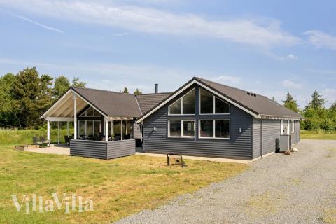 Dieses schöne Poolhaus Nr. 396 mit Platz für 16 Personen liegt in Westjütland