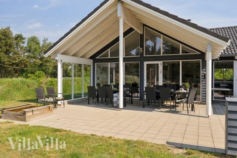 Das Luxusferienhaus Nr. 396 hat eine tolle Terrasse, die mit hochwertigen Gartenmöbeln für 16 Personen ausgestattet ist.
