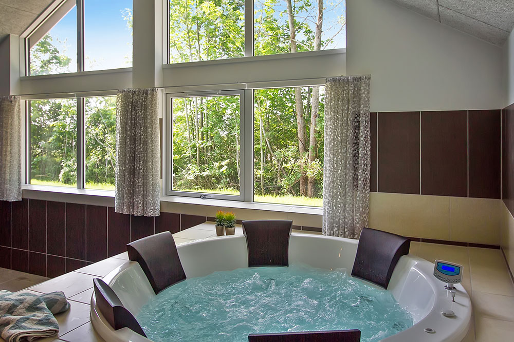 Genießen Sie den warmen Whirlpool im Luxusferienhaus Nr. 713 in Deutschland