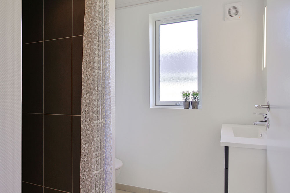 Eines der Badezimmer im Luxusferienhaus Nr. 713