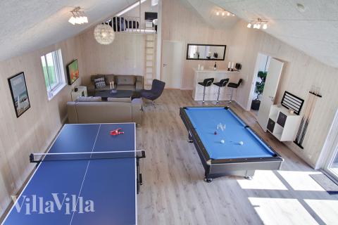 Neben den vielen schönen Stunden, die man im Poolbereich des Hauses verbringen kann, bietet das Luxusferienhaus 706 auch Spielevergnügen bei Billard/Tischtennis und Darts