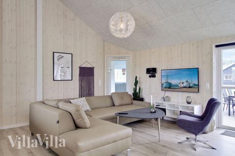 Aufenthaltsraum mit Platz für 24 im Luxusferienhaus Nr. 706.