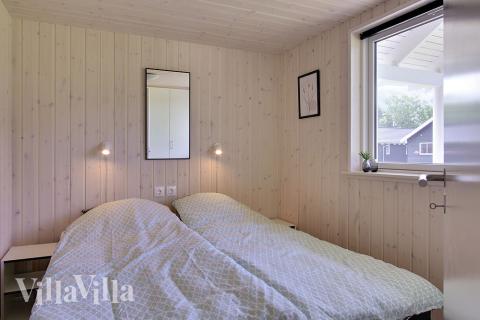 Eines der 9 Schlafzimmer im Luxusferienhaus Nr. 706