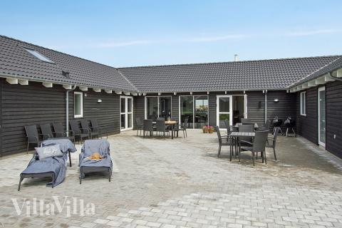 Genießen Sie einen Grillabend auf der Terrasse des Luxusferienhauses Nr. 706 in Deutschland