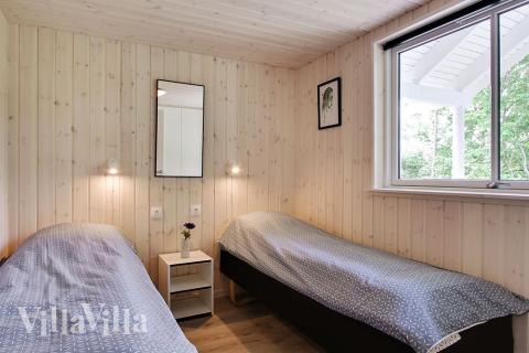 Eines der 9 Schlafzimmer im Luxusferienhaus Nr. 714