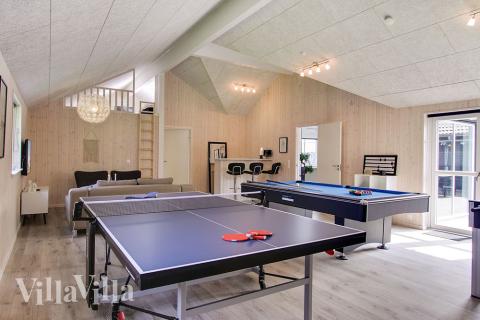 Neben den vielen schönen Stunden, die man im Poolbereich des Hauses verbringen kann, bietet das Luxusferienhaus 714 auch Spielevergnügen bei Billard/Tischtennis und Darts