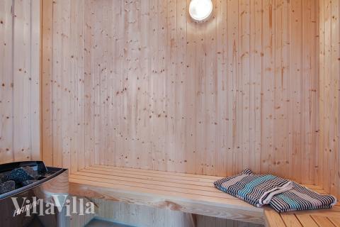 Genießen Sie die heiße Sauna im Luxusferienhaus Nr. 714 für 24 Personen