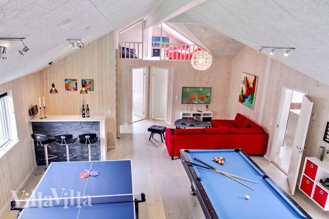 Neben den vielen schönen Stunden, die man im Poolbereich des Hauses verbringen kann, bietet das Luxusferienhaus 715 auch Spielevergnügen bei Billard/Tischtennis und Darts