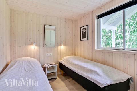 Eines der 8 Schlafzimmer im Luxusferienhaus Nr. 715