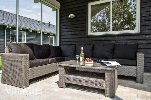 Genießen Sie einen Grillabend auf der Terrasse des Luxusferienhauses Nr. 715 in Deutschland