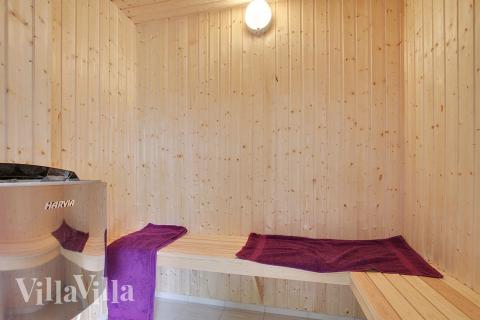 Genießen Sie die heiße Sauna im Luxusferienhaus Nr. 715 für 20 Personen