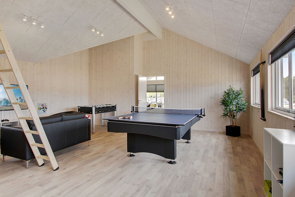 Neben den vielen schönen Stunden, die man im Poolbereich des Hauses verbringen kann, bietet das Luxusferienhaus 399 auch Spielevergnügen bei Billard/Tischtennis und Darts