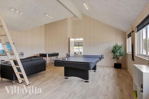 Neben den vielen schönen Stunden, die man im Poolbereich des Hauses verbringen kann, bietet das Luxusferienhaus 399 auch Spielevergnügen bei Billard/Tischtennis und Darts