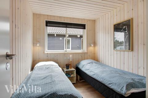 Eines der 7 Schlafzimmer im Luxusferienhaus Nr. 399