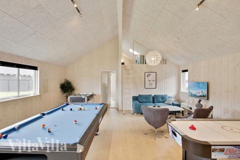 Neben den vielen schönen Stunden, die man im Poolbereich des Hauses verbringen kann, bietet das Luxusferienhaus 388 auch Spielevergnügen bei Billard/Tischtennis und Darts