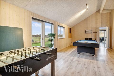 Neben den vielen schönen Stunden, die man im Poolbereich des Hauses verbringen kann, bietet das Luxusferienhaus 397 auch Spielevergnügen bei Billard/Tischtennis und Darts