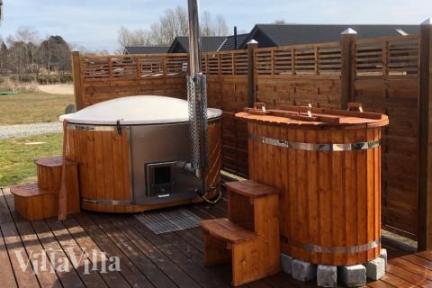 Zu dem attraktiven Ferienhaus Nr. 398 in Nordseeland gehört auch ein tolles Angebot im Außenbereich, z. B. Spieleturm und Schaukeln