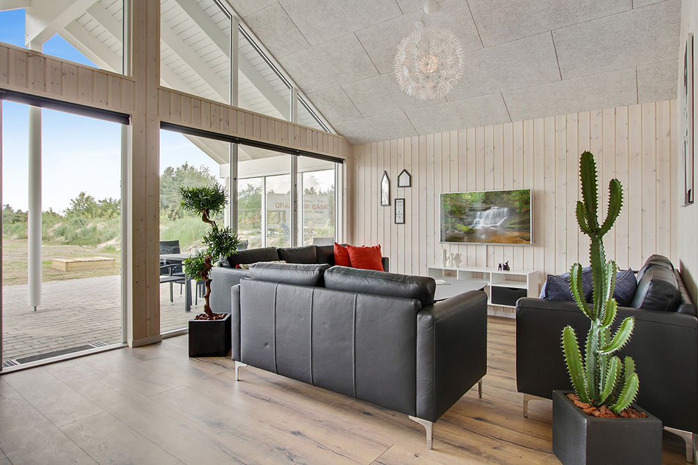 Aufenthaltsraum mit Platz für 18 im Luxusferienhaus Nr. 390.