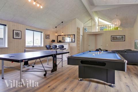 Neben den vielen schönen Stunden, die man im Poolbereich des Hauses verbringen kann, bietet das Luxusferienhaus 707 auch Spielevergnügen bei Billard/Tischtennis und Darts