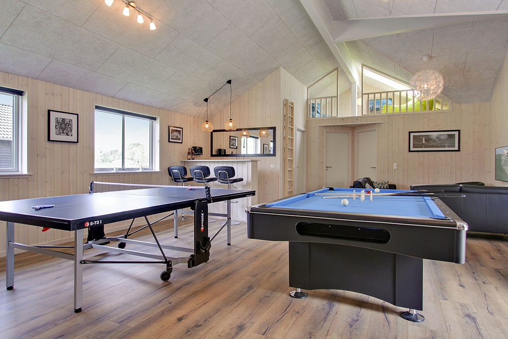 Neben den vielen schönen Stunden, die man im Poolbereich des Hauses verbringen kann, bietet das Luxusferienhaus 707 auch Spielevergnügen bei Billard/Tischtennis und Darts