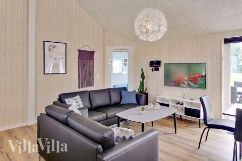 Aufenthaltsraum mit Platz für 20 im Luxusferienhaus Nr. 707.