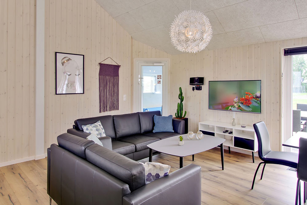 Aufenthaltsraum mit Platz für 20 im Luxusferienhaus Nr. 707.