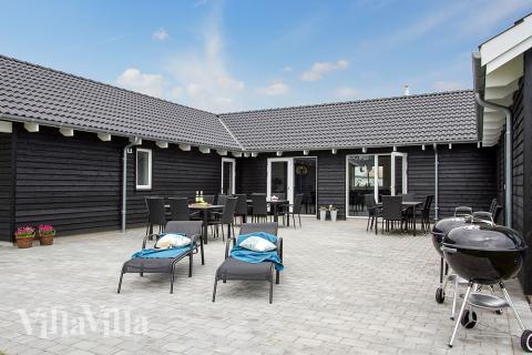 Das Luxusferienhaus Nr. 707 hat eine tolle Terrasse, die mit hochwertigen Gartenmöbeln für 20 Personen ausgestattet ist.