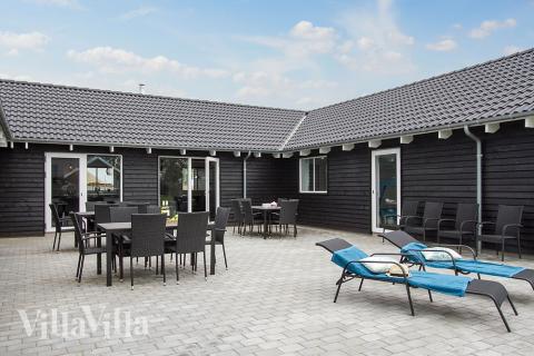 Genießen Sie einen Grillabend auf der Terrasse des Luxusferienhauses Nr. 707 in Deutschland