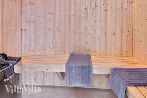 Genießen Sie die heiße Sauna im Luxusferienhaus Nr. 707 für 20 Personen