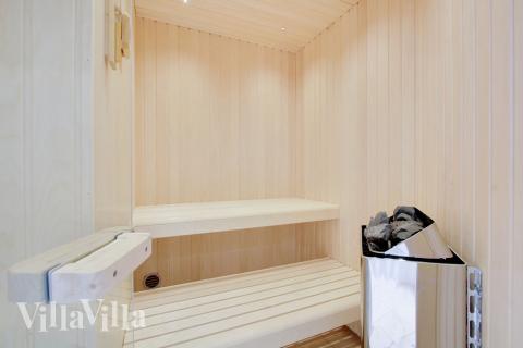 Genießen Sie die heiße Sauna im Luxusferienhaus Nr. 400 für 24 Personen
