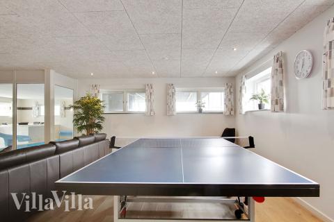 Aktivitätsraum im Luxusferienhaus Nr. 400 mit 9 Schlafzimmern und Platz für 24 Gäste.