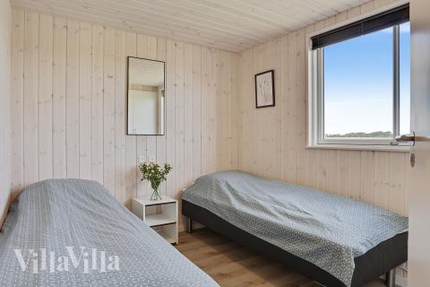 Eines der 7 Schlafzimmer im Luxusferienhaus Nr. 405