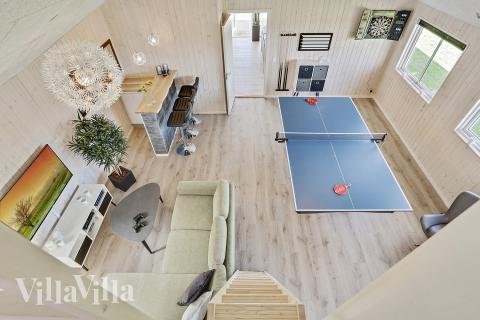 Das Luxusferienhaus 405 für 18 Personen hat einen großen Aktivitätsraum mit u. a. Billard und Darts