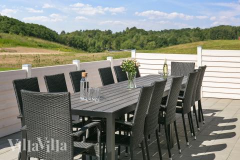 Genießen Sie einen Grillabend auf der Terrasse des Luxusferienhauses Nr. 405 in Limfjord
