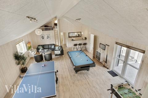 Neben den vielen schönen Stunden, die man im Poolbereich des Hauses verbringen kann, bietet das Luxusferienhaus 406 auch Spielevergnügen bei Billard/Tischtennis und Darts