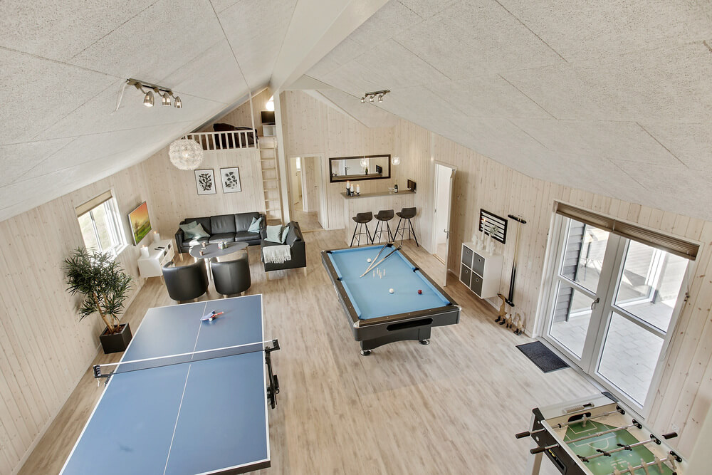 Neben den vielen schönen Stunden, die man im Poolbereich des Hauses verbringen kann, bietet das Luxusferienhaus 406 auch Spielevergnügen bei Billard/Tischtennis und Darts