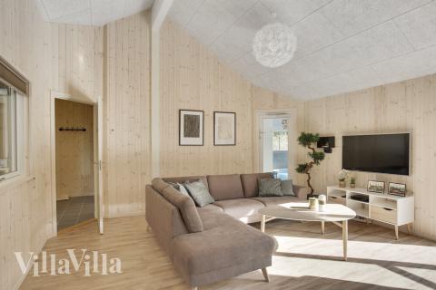 Der Aufenthaltsraum bietet Platz für 24 Personen, wenn ihr das Ferienhaus 406 in Nordseeland besucht.