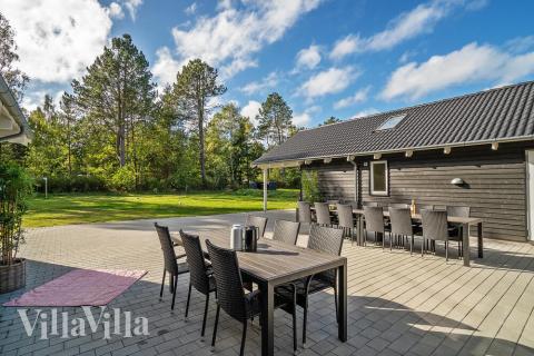 Das Luxusferienhaus Nr. 406 hat eine tolle Terrasse, die mit hochwertigen Gartenmöbeln für 24 Personen ausgestattet ist.