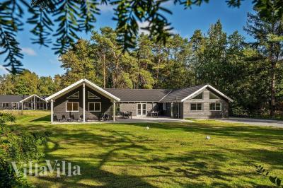 Dieses schöne Poolhaus Nr. 406 mit Platz für 24 Personen liegt in Nordseeland