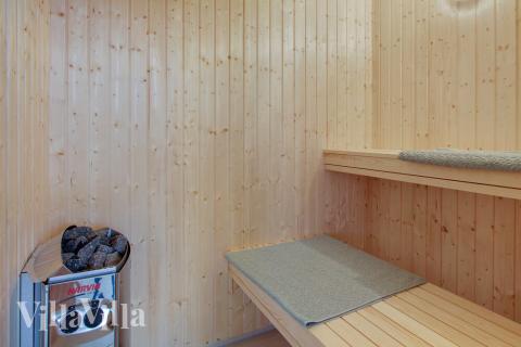 Genießen Sie die heiße Sauna im Luxusferienhaus Nr. 407 für 22 Personen