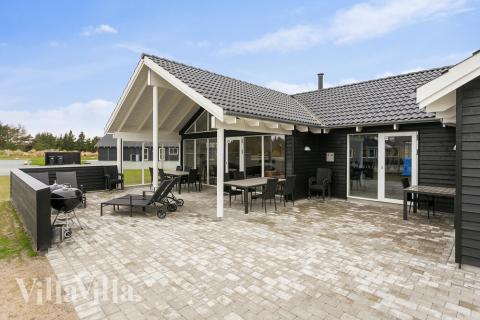 Das Luxusferienhaus Nr. 407 hat eine tolle Terrasse, die mit hochwertigen Gartenmöbeln für 22 Personen ausgestattet ist.