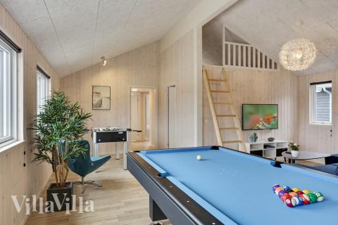 Neben den vielen schönen Stunden, die man im Poolbereich des Hauses verbringen kann, bietet das Luxusferienhaus 408 auch Spielevergnügen bei Billard/Tischtennis und Darts